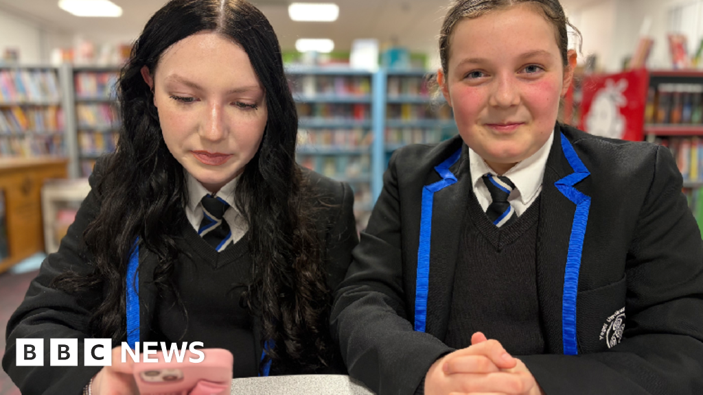 Why one school has banned phones for some pupils – but not others
