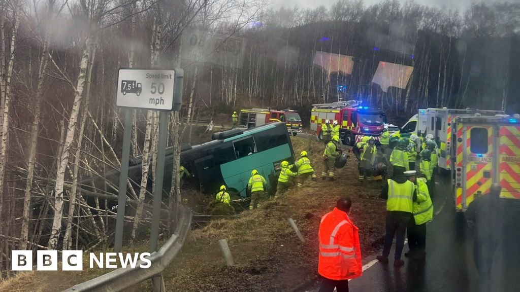 Two in hospital after bus crashes down embankment in the Highlands