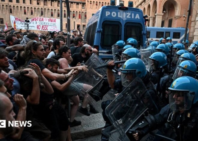 Italy protests: Dozens hurt in Bologna after man dies while being restrained by police