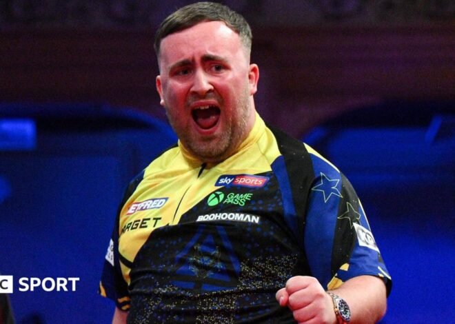 World Matchplay: Luke Littler throws nine-darter in thrilling win over Nathan Aspinall at Winter Gardens in Blackpool