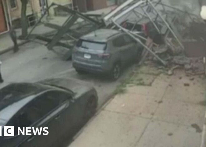Surveillance video shows the moment empty building collapses