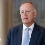 Former Lloyd’s of London boss’s relationship breached rules, firm says