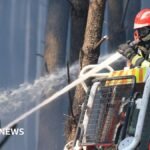 France wildfire crews face searing heat in battle to contain flames