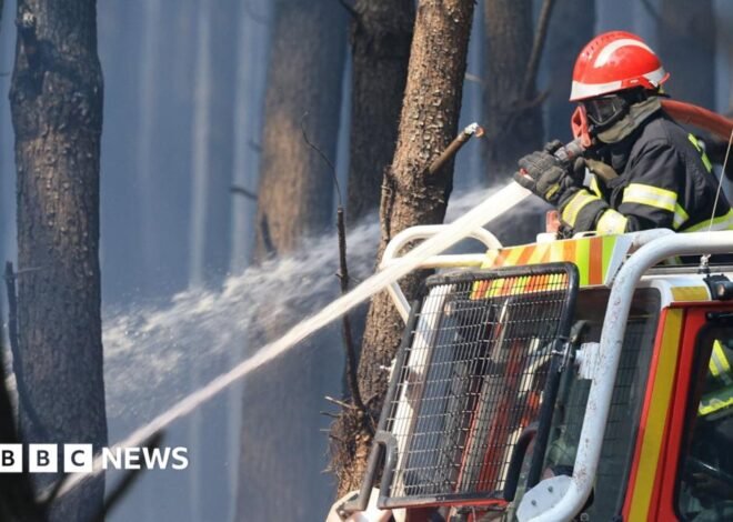 France wildfire crews face searing heat in battle to contain flames