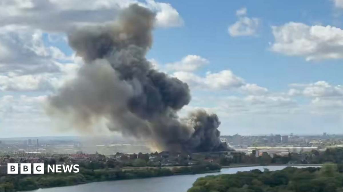 Huge fire at Neasden waste facility shuts Tube and train lines