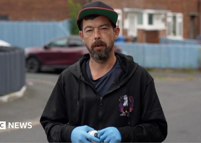'Minion Man' paints over estate's obscene graffiti