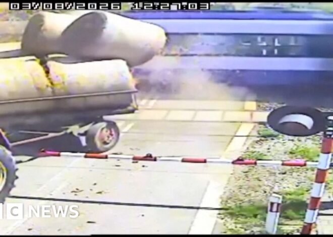 Watch: Moment passenger train crashes with trailer carrying straw bales