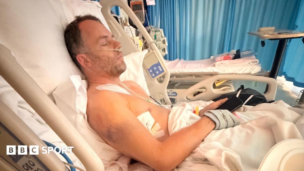 Ollie Millroy thanks Loek Hartog for saving him from his burning car