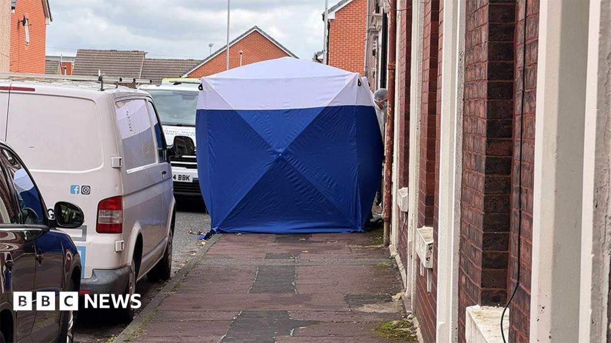 Son charged with murdering parents in Blackburn home