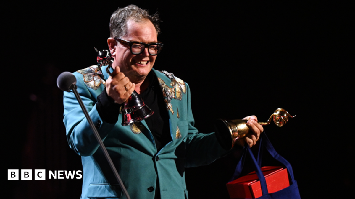 Alan Carr holds back tears on special night at National Television Awards
