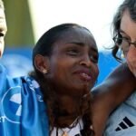 Berlin Marathon: Tigst Assefa wins but injury halts world record time