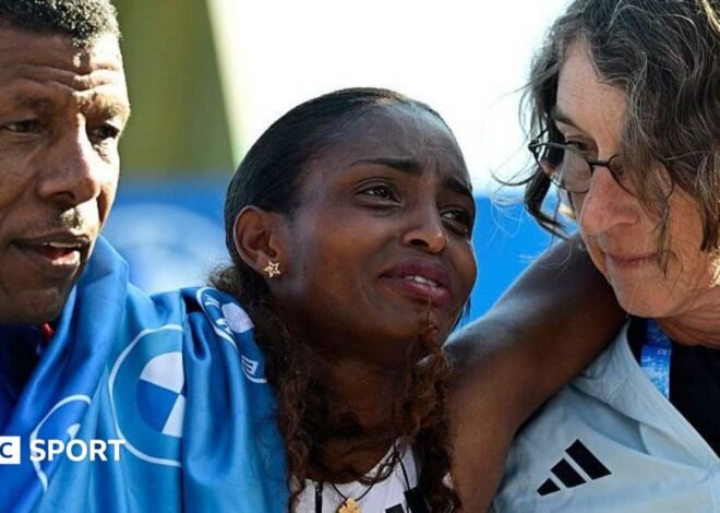 Berlin Marathon: Tigst Assefa wins but injury halts world record time