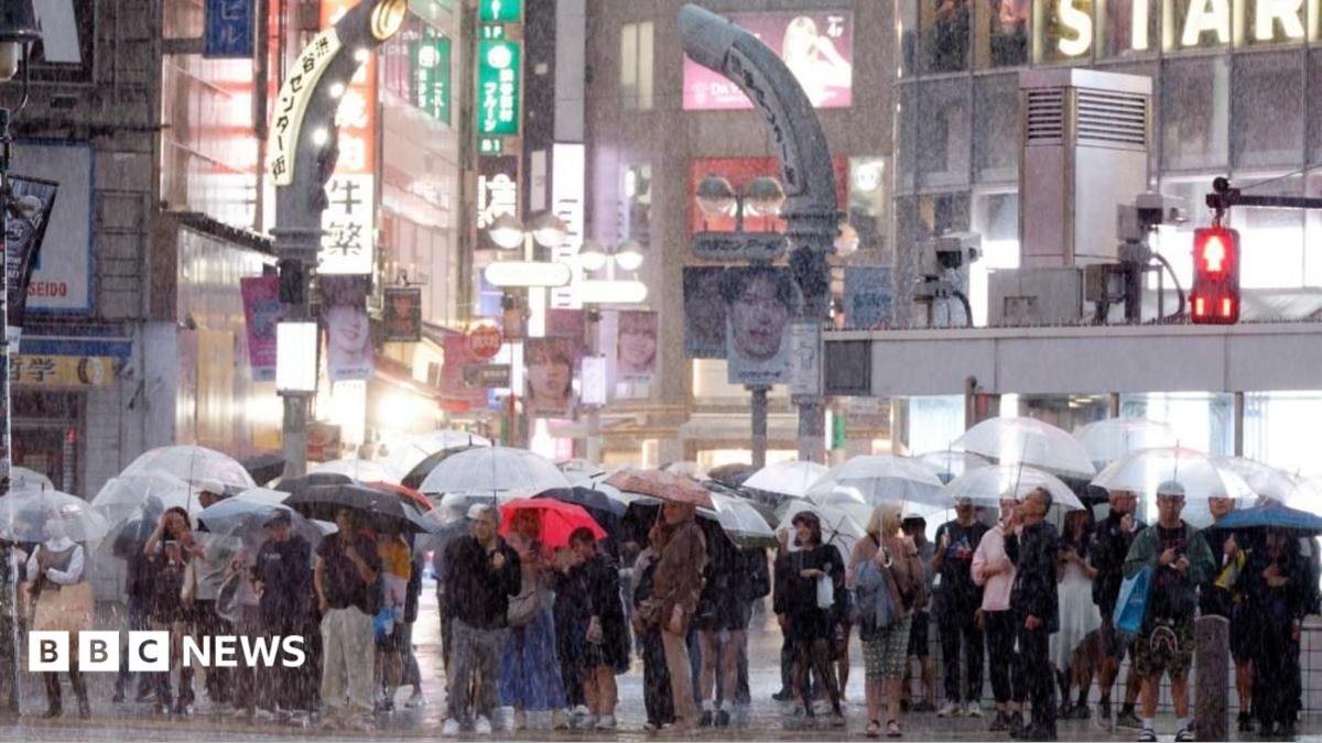 Millions urged to evacuate as Typhoon Dujuan hits Japan