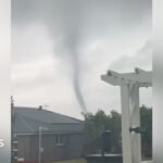 Rare tornado whips through small Australian town